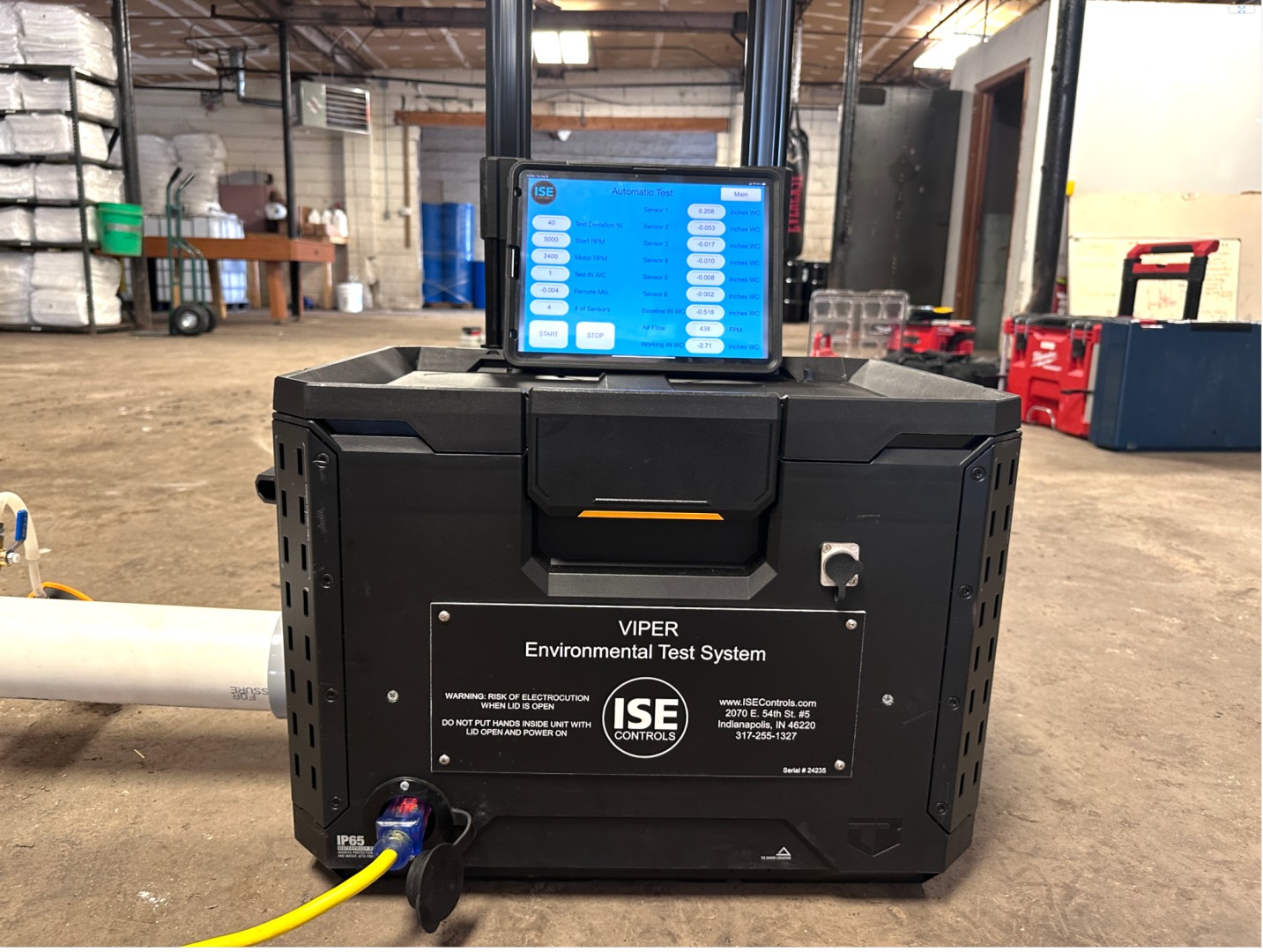A VIPER Environmental Test System with a digital display on top, located in a warehouse or industrial space.